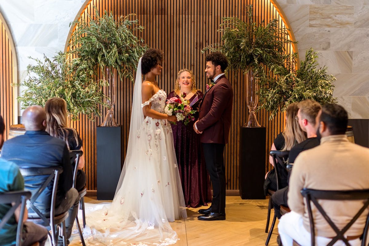 a group of people standing in front of a building